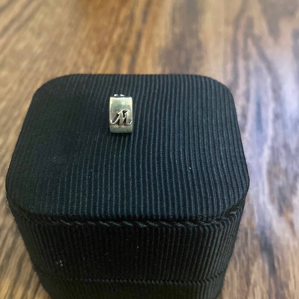 Tara’s Diary “M” charm with trinity knot